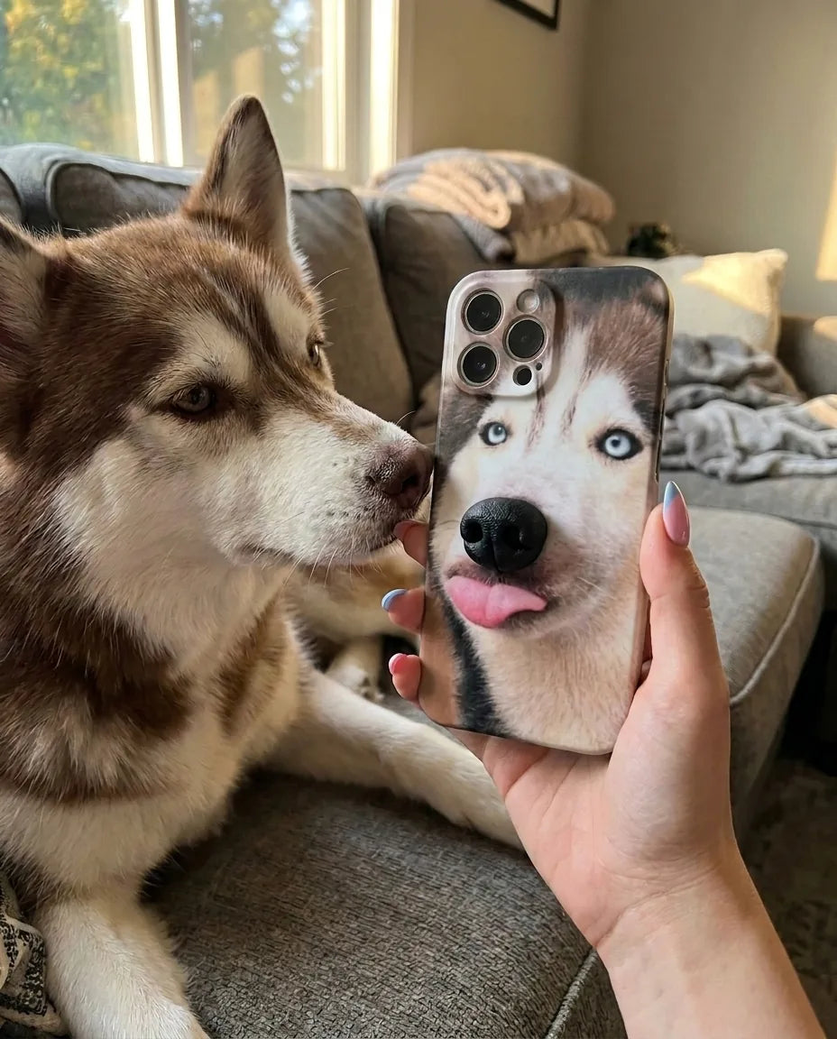 BoopNose Husky iPhone case next to a real dog sniffing the 3D nose