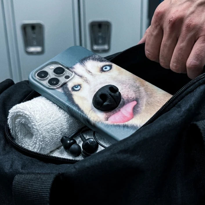 Close-up of the soft raised silicone nose on a BoopNose case held at an angle